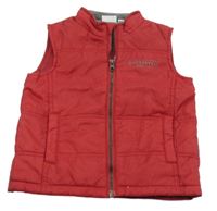 Červená prešívaná šušťáková zateplená vesta s nápisom impidimpi