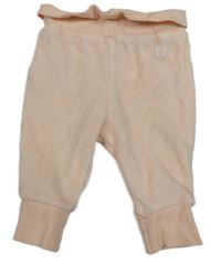 Ružové zamatové tepláky s nášivkou