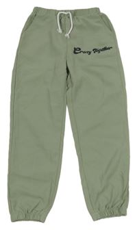 Svetlozelené cuff nohavice s nápisom Shein