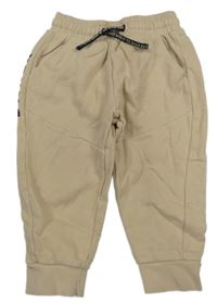 Béžové chino tepláky s logem TED BAKER