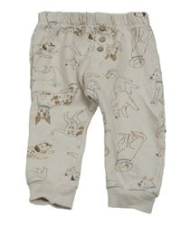 Smotanové tepláky s pejsky