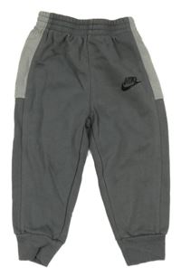 Šedé tepláky s logem Nike