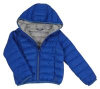 Tmavomodrá šušťáková lehce zateplená bunda s kapucňou