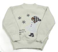 Smotanový sveter s dívkou a vločkami