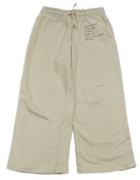 Béžové tepláky s nápisem H&M