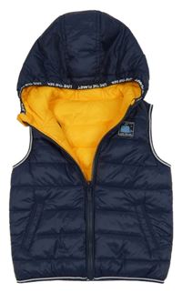 Tmavomodrá šušťáková prešívaná zateplená obojstranná vesta s kapucňou C&A