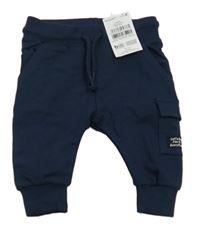 Nové - tmavomodré tepláky s kapsami Next