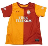 Oranžovo-červený sportovní dres s nápisem Nike 
