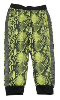 LImetkovo-černé vzorované sportovní tepláky s pruhem