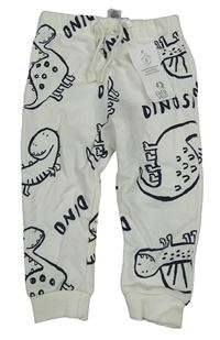 Nové - Smetanové tepláky s dinosaury F&F