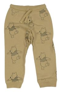 Svetlohnedé tepláky s medvídkem Pú H&M