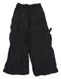 Čierne šušťákové široké nohavice s vreckami H&M