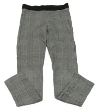 Čierno-biele kockované legíny H&M