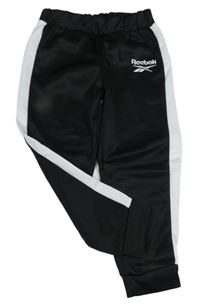 Černo-bílé sportovní tepláky s pruhy a logem Reebok