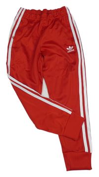Červeno-bílé sportovní tepláky s pruhy a logem Adidas