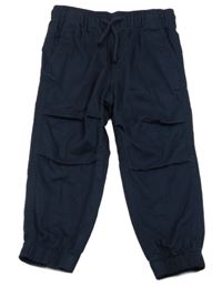 Tmavomodré plátenné cuff nohavice H&M