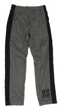 Tmavosivé športové tepláky s čierným pruhom crivit