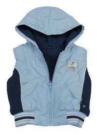 Světlemodro-tmavomodrá šušťáková zateplená vesta s kapucňou St. Bernard