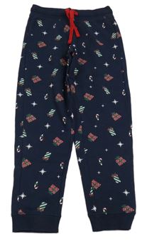 Tmavomodré vianočné tepláky s darčekmi a lízátky lupilu