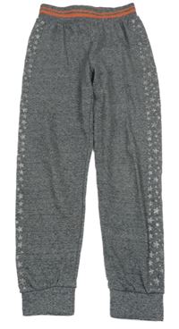 Sivo-oranžové melírované tepláky s hviezdami