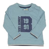 Svetlomodré tričko s nápisom a číslom