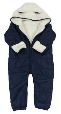 Tmavomodrá prešívaná šušťáková zimná kombinéza s bielou huňatou kapucňou s uškami zn. Matalan