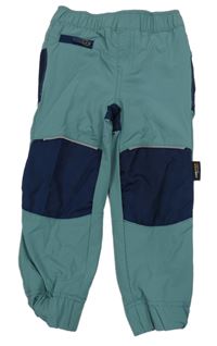 Modrošedo-tmavomodré šusťákové funkční podšité kalhoty crane