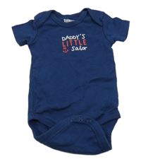 Tmavomodré body s nápisom Lupilu