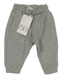 Nové - Šedé melírované tepláky Zara