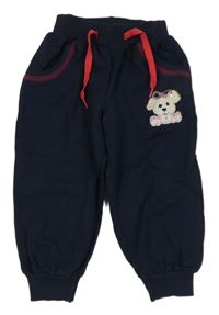 Tmavomodré tepláky s psem s flitrami