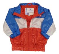 Červeno-bílo-modrá šusťáková jarní bunda 