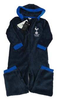 Nové - Tmavomodrá chlupatá kombinéza s nášivkou a kapucí 