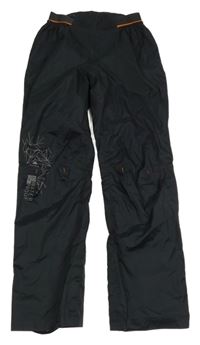 Čierne šušťákové neprokokavé nohavice so vzorom Decathlon