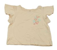 Pudrové tričko s jahůdkami a volánikmi H&M