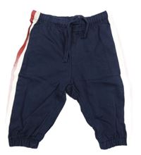 Tmavomodré tepláky s bílým a červeným pruhom H&M