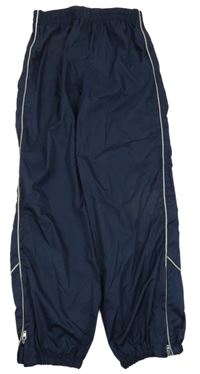 Tmavomodré šušťákové nepromokavé nohavice