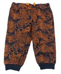 Tmavomodro-oranžové tepláky s listy 