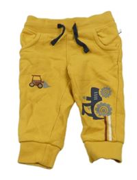 Horčicové tepláky s bagrami Liegelind