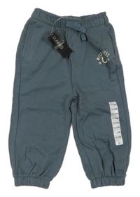 Nové - Šedé tepláky s nápisem a podkovou Dunnes