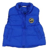 Modrá šušťáková zateplená vesta s nášivkou