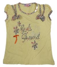 Žlto-béžové tričko s nápisom a 3D mašľami