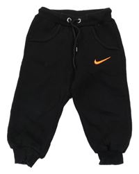 Černé tepláky s logem Nike