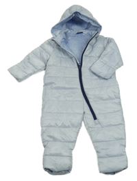 Světlemodrá prošívaná šusťáková zimní kombinéza s odepínací kapucí lupilu