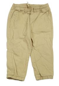 Béžové plátenné nohavice Kiabi