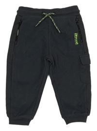 Tmavomodré tepláky s kapsou Next