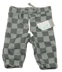 Nové - Šedo-tmavošedé kostkované tepláky Primark