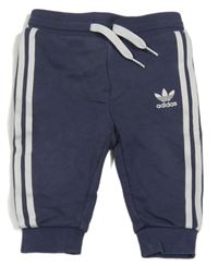 Tmavomodré tepláky s logem Adidas