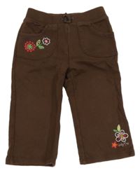 Hnědé tepláky s kytičkami GAP