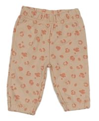 Světlebroskvovo-ružové vzorované tepláky zn. PRIMARK