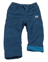 Petrolejové šušťákové zateplené nohavice s úpletovým pasom a číslom Topomini